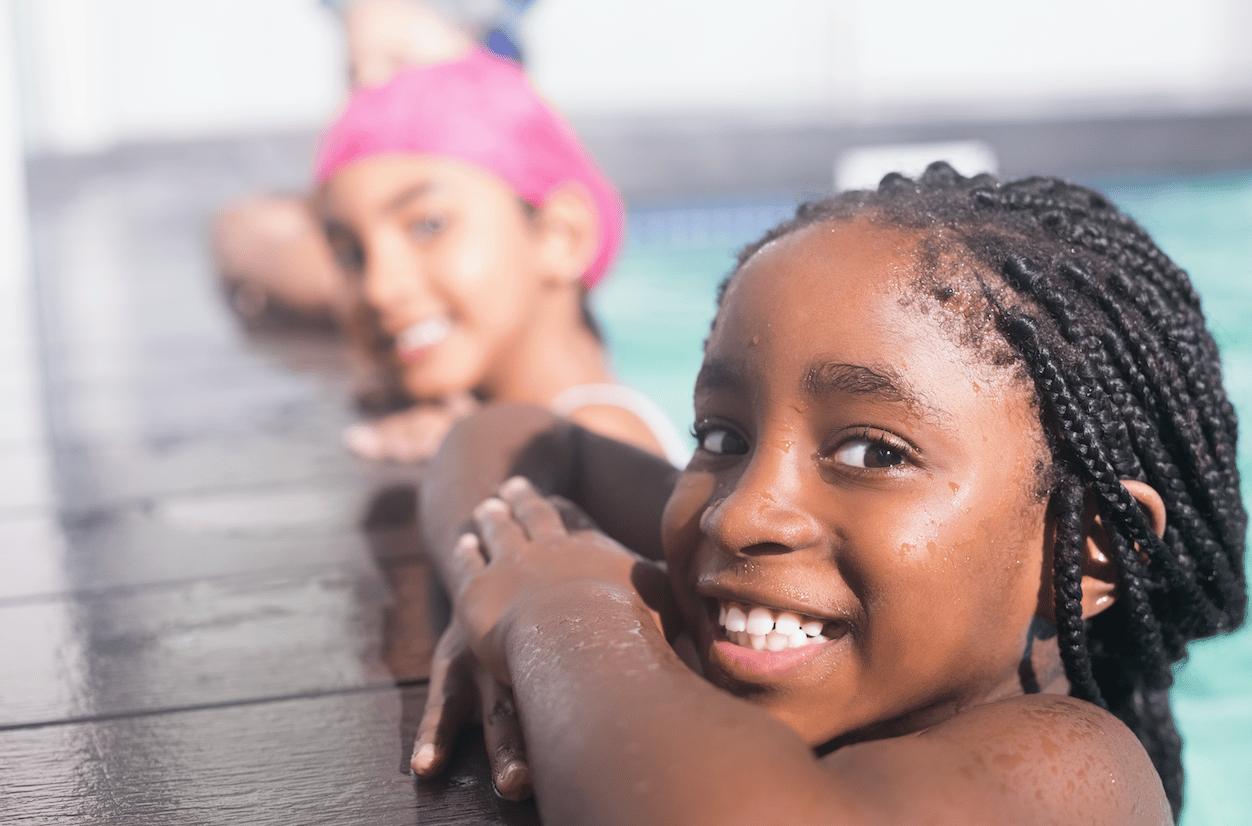 Children at side of swimming pool
