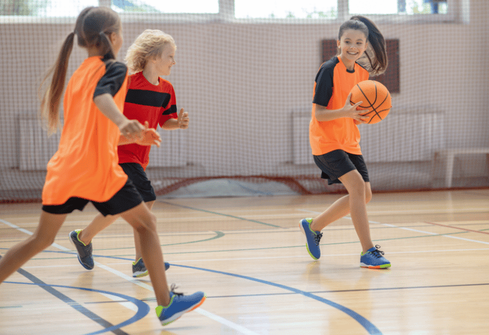 Girls playing Basketball