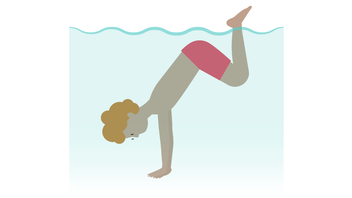 Submerged swimmer hands on floor
