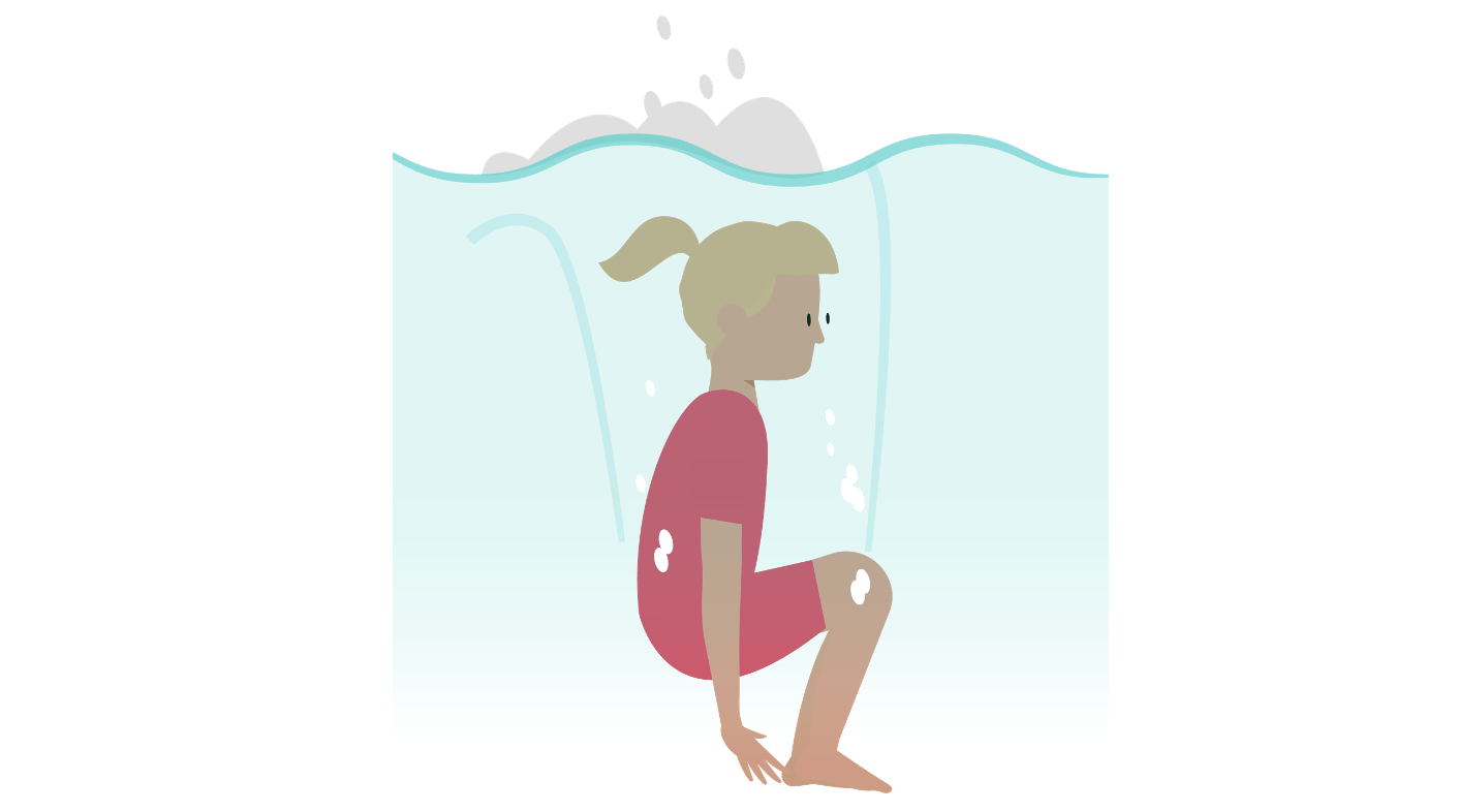 Swimmer submerging under water