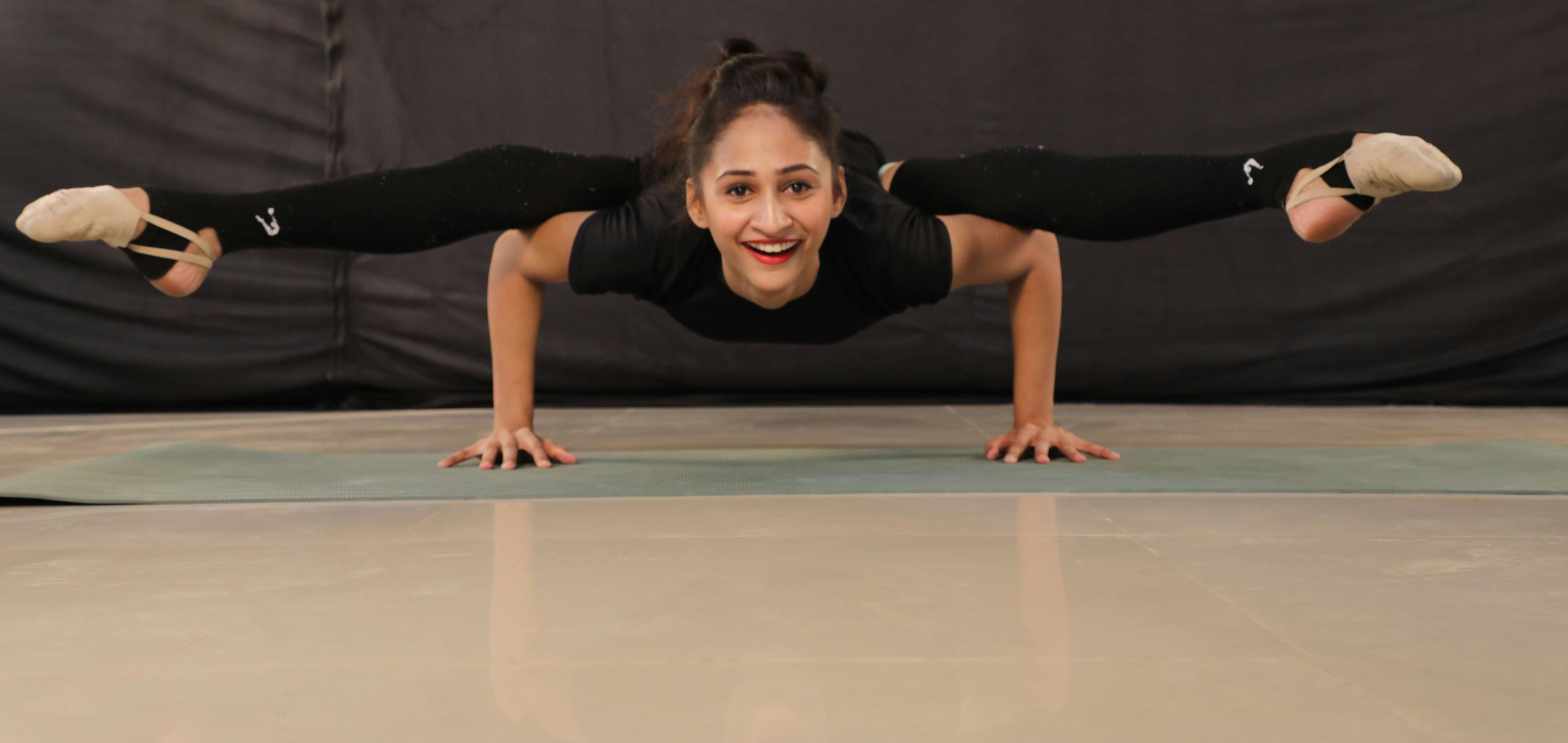 A confident student working on gymnastics skills