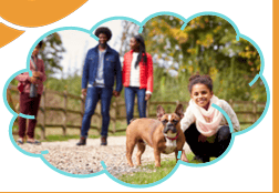 A family playing with a dog