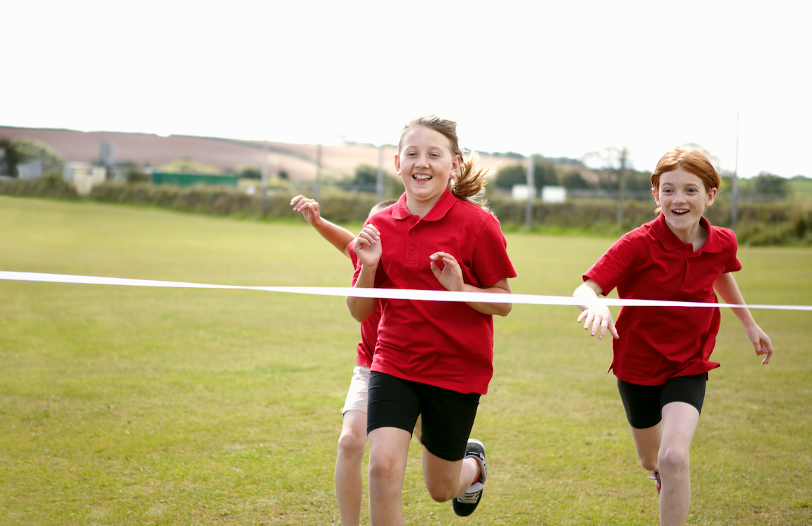 Girls engaging in PE lesson which has exciting PE planning